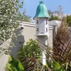 Mulberry-Designs-Victorian-Birdhouse-Backyard-South-Wall